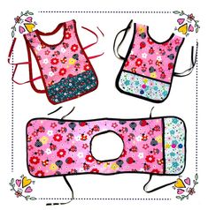 three bibs with flowers and hearts on them, one has a pink flowered design