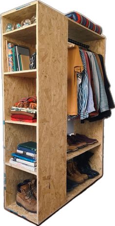 an open closet with clothes and shoes on the shelves, all in plywood wood