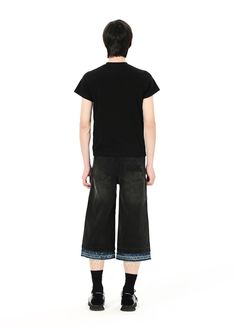 Versatile Double Waist Denim Capris - Embrace style and comfort with our unisex, 100% denim cotton capris. Designed with a unique double waist structure, contrast hems, ripped detailing, and IN TERRIS embroidery and leather patch. Perfect for any occasion. Available in Small, Medium, and Large sizes. Check our detailed size chart for precise measurements: SIZE (CM) LENGTH WAIST BUTT SMALL 80 74 92 MEDIUM 82 82 100 LARGE 83 86 104 Black Cotton Cropped Jeans, Casual Black Cropped Jeans With Frayed Hem, Summer Cropped Capri Jeans In Cotton, Casual Knee-length Cropped Denim Jeans, Cotton Capri Length Jeans For Summer, Dark Wash Cotton Knee-length Jeans Shorts, Dark Wash Knee-length Cotton Jeans Shorts, Dark Wash Knee-length Jeans Shorts, Dark Wash Knee-length Cotton Jeans