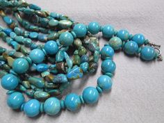 Genuine Turquoise Necklace. Have the waters of the Bermudian Seas floating around your neck here with this luscious genuine turquoise necklace. The shades of blue are magnificent! The large round beads measure 18mm wide and the smaller rondelle turquoise are about 8mm. It is 18" long, and you can always add an extender if desired. Wear it alone or add more turquoise, chains, or pearls for your one of a kind look. This actually comes from the estate of a well know actress. I believe this was craf Turquoise Beaded Necklace, Turquoise Bead Necklaces, Palm Beach Fl, Turquoise Cuff, Blue Gems, Kingman Turquoise, Genuine Turquoise, West Palm Beach, Turquoise Beads