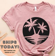 You've now found the staple t-shirt of your wardrobe. It's made of very soft cotton. And the double stitching on the neckline and sleeves add more durability to what is sure to be a favorite! Handmade item * 100% ringspun cotton * 4.5 oz/y² (153 g/m²) * Pre-shrunk * Shoulder-to-shoulder taping * Quarter-turned to avoid crease down the center. We use the latest in Direct to garment printing (DTG) technology to ensure high quality products. Vacation Crew Neck Top With Tropical Print, Pink Crew Neck Shirt For Vacation, Hawaiian Cotton Shirt With Crew Neck, Vacation Graphic Print Shirt With Crew Neck, Crew Neck Top With Palm Tree Print For Vacation, Cotton Hawaiian Shirt With Crew Neck, Cotton Tops With Palm Tree Print For Vacation, Cotton Top With Palm Tree Print For Vacation, Palm Tree Print Crew Neck Top For Vacation