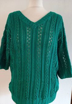 "Great condition hand knit jumper  No labelling but yarn feels like cotton or cotton mix in emerald green Short sleeved Front and back V shaped neckline Actual measurements in inches  Measurements taken relaxed  Back neck width 8.5\" Across shoulder 24\" Armhole circ 15\" Sleeve length 8\" Sleeve opening 7\" Chest 40\" Waist 38\" Hem 35\" Length from side neck point to hem 26\" To see more vintage follow www.etsy.com/shop/skinnyrib" Green Knit V-neck Sweater, Green V-neck Knitted Sweater, Green Knitted Top For Winter, Green Long Sleeve Crochet Top For Fall, Green Textured Knit Sweater, Green Pointelle Knit Sweater, Green Knitted Crew Neck Top, Green Pointelle Knit Top For Winter, Green Open Knit Crew Neck Top