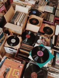 many records are stacked on top of each other