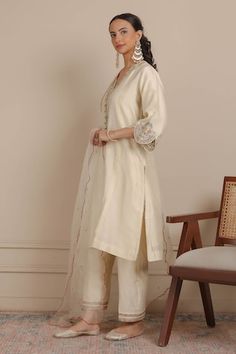 Ivory kurta with floral embroidered scallop hem sleeve and neckline. Paired with an embroidered hem pant and scallop border dupatta. - Aza Fashions Cream Sets With Embroidered Border, Fitted Cream Sets With Embroidered Border, Cream Fitted Sets With Embroidered Border, Scallop Border, Embroidered Hem, A Line Kurta, Scallop Hem, Straight Kurta, How To Hem Pants