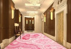 the hallway is decorated with pink carpet and chandeliers