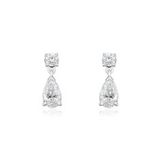 Pair of Diamond drop earrings.Each earring comprises of a Pear Cut Diamond suspended from a Round Brilliant Cut Diamond. DETAILS Total weight of pear cut Diamonds 1.01ctsEstimated colour and clarity D/E VS/SITotal weight of Round Brilliant Cut Diamonds 0.21ct Setting: Platinum Claw Settings Pear Cut Diamond, Diamond Drops, Diamond Drop Earrings, Pear Cut, Round Brilliant Cut Diamond, Pear Shape, Brilliant Cut Diamond, Pear Shaped, Round Brilliant