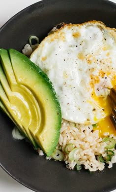 a plate with eggs, rice and avocado on it is featured in the magazine healthy eating plan for picky eaters