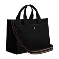 Detailed with cursive Coach script embroidery and iconic turnlock closure, this spacious Cargo tote has an open interior with room for a 13' laptop, two outside pockets for easy organization, and a removable webbing strap for shoulder or crossbody wear..Medium sized bag; 13-1/2'W x 10'H x 6-1/4'D (width is measured across the bottom of handbag).Silhouette is based off 5'9' model.4-1/2' straps; 24' removable strap.Zip closure.Silver-tone hardware, exterior turn-lock & snap pockets.Laptop compatible (std. size 13'-15').Cotton, polyester, leather.Spot clean Coach Leather Trim Bags, Coach Leather Trim Satchel For Travel, Coach Satchel With Leather Trim For Travel, Coach Travel Satchel With Leather Trim, Coach Canvas Bag With Leather Trim, Coach Luxury Briefcase For Everyday, Luxury Coach Briefcase For Travel, Luxury Coach Travel Briefcase, Coach Canvas Travel Bag