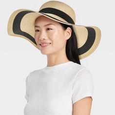 Update your summer accessories with this Striped Straw Floppy Hat from Shade & Shore™. This woven floppy hat features a striped pattern for a chic, contrasting look. Made of midweight paper straw material, it provides a comfortable fit for all-day wear, and the pull-on style makes it easy to put on or take off. Plus, the 4.75-inch brim keeps your face shaded from the sun's rays. Shade & Shore™: Found exclusively at Target. Black Summer Sun Hat For Warm Weather, Adjustable Striped Straw Hat For Vacation, Black Summer Hat For Warm Weather, Striped Straw Sun Hat For Summer, Striped Straw Sun Hat For Spring, Chic Floppy Sun Hat For Spring, Spring Striped Straw Sun Hat, Chic Floppy Beach Hat, Chic Floppy Straw Hat For Spring