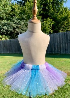 Large Sequin Tulle Choose up to 5 colors for one custom tutu. Tulle are colors listed in photo This sparkly large sequin Tutu is a perfect for your little ones birthday party or any event.  This tutu is handmade, by me,  using large sequin tulle  and an elastic band with ends sewn together. Every piece of tulle is hand tied onto the the elastic band making a gorgeous full tutu!  Each Tutu is made to order, be sure to measure your little one before ordering. Please message me, with any questions on sizing I'm happy to help! Fitted Tutu Dress With Glitter Tulle Skirt, Blue Princess Tutu Dress For First Birthday, Princess Style Blue Tutu Dress For First Birthday, Fairy Tulle Tutu Party Dress, Fairy Tulle Tutu Dress For Party, Princess Tulle Tutu Dress For First Birthday, Princess Style Tulle Tutu Dress For First Birthday, Fairy Style Tulle Tutu Party Dress, Cute Glitter Tulle Tutu Dress For Dress-up