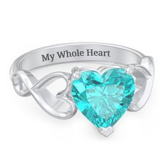 Sterling Silver Heart Shaped Stone with Interwoven Heart Infinity Band Ring and Mint Premium Zirconia Stone | Jewlr Affordable Sterling Silver Heart Ring For Anniversary, Affordable Heart Cut Ring For Anniversary, Heart Solitaire Ring Blue Nile, Cheap Heart-shaped Ring For Anniversary, Cheap Heart Cut Promise Ring, Luxury Heart Shaped Anniversary Birthstone Ring, Silver Heart Jewelry Rainbow Topaz Heart Ring With Celtic Knot, Silver Heart Jewelry Rainbow Topaz Heart Ring With Celtic Knot With Rainbow Topaz Heart Ring With Celtic Knot, Rainbow Topaz Boho Heart Rings Knot