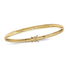 Illuminate her wrist with the brilliance and comfort of this sleek flexible bangle bracelet. Crafted in warm 14K gold, this 4.0mm-wide design is as attractive worn alone as it is when worn with her other bracelets. Polished to a bright shine, this 8.0-inch bangle secures with a tongue and groove clasp. Metal Stamped Jewelry, Tongue And Groove, Stamped Jewelry, Christmas Sale, Gold Bangles, Metal Stamping, Bracelet Designs, Yellow Color, Bangle Bracelet