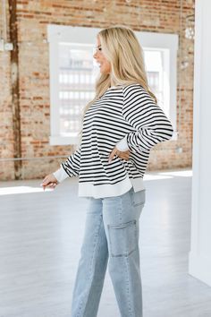 Experience ultimate comfort and style with our Pierce Striped Loose Sweatshirt! Made with soft and breathable fabric, this sweatshirt features a trendy striped design that will elevate any casual look. Embrace effortless fashion and cozy vibes with our Pierce Striped Loose Sweatshirt. Model Info: Models are 5'7", Size 2, wearing smalls Material: 95% Cotton + 5% Elastane Sizes Bust Hem_Width Sleeve_Length Length Relax Relax Relax Relax S 44.9 41.3 27.7 26.8 M 47.2 43.7 28.3 27.6 L 49.6 46.1 29.0 Casual Tops With Striped Cuffs For Fall, Casual Black Sweater With Striped Cuffs, Fall Tops With Striped Cuffs And Relaxed Fit, Casual Sweater With Striped Sleeves And Crew Neck, Casual Sweatshirt With Contrast Stripes In Relaxed Fit, Casual Sweater With Contrast Stripes And Relaxed Fit, Black Long Sleeve Tops With Striped Hem, Casual Black Tops With Striped Cuffs, Black Long Sleeve Top With Striped Hem