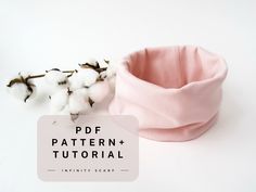 a pink bandana next to cotton flowers on a white background with text overlay that reads, pdf pattern + tutor