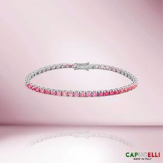 Beautiful Sapphire Tennis Bracelet. A staple in your jewelry collection. Handmade in Italy. This tennis Bracelet showcases a delicate box chain embellished with dozens of shimmering Pink Sapphires. Quality to us is important and that is why we hand select our diamonds for premium quality. ≫ Round Pink Shaded Sapphires Luxury Pink Diamond Bracelet As Gift, Pink Sapphire Bracelet As A Gift, Elegant Pink Sapphire Bracelets, Fine Jewelry Pink Gemstone Tennis Bracelet, Luxury Pink Sapphire Bracelets, Luxury Pink Diamond Jubilee Bracelet, Pink Fine Jewelry Tennis Bracelet, Luxury Pink Tennis Bracelet Gift, Pink Diamond Bracelet With Gemstone In Fine Jewelry Style