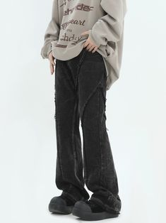 Experience effortless style with our Distressed Crinkle Texture Wide Leg Pants, where comfort meets timeless fashion. These pants are designed with a discerning eye for detail, featuring a robust denim fabric that speaks to durability and a crinkle texture that adds an edgy appeal. The non-stretch, high waist fit is paired with a tasteful distressing process, giving these pants a unique personality that stands out in a crowd. With a focus on craftsmanship, the pants sport a washed look adorned w Relaxed Fit Wide Leg Ripped Pants, Ripped Wide Leg Relaxed Fit Pants, Distressed Stretch Wide Leg Pants, Wide Leg Stretch Distressed Pants, Stretch Wide Leg Distressed Pants, Baggy Distressed Washed Black Pants, Baggy Wide-leg Ripped Pants, Distressed Baggy Straight Leg Pants, Casual Wrinkled Wide Leg Bottoms