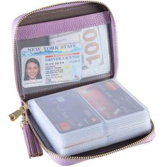 an open purse filled with passport and id cards