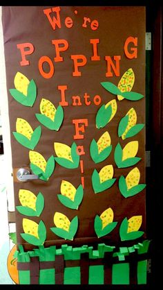 a bulletin board with corn on the cob and we're popping into it