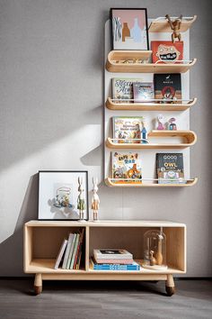 there is a shelf with books on it