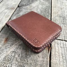 "Personalized Kangaroo Leather 5 Pocket Wallet, Billfold Wallet, Bifold Wallet, Custom Wallet, Unique Wallet, 4 Card Pockets, 1 Cash Pocket ❉ Optional PERSONALIZATION ❉ Kangaroo Leather Bifold Wallet This wallet is a classic design bifold allowing you to carry your cash and cards all within a natural full grain Kangaroo leather.  Made from full grain Kangaroo Leather it is extremely tough, and with care will last for many years. The central cash slot is big enough to hold US, Canadian and Austra Brown Bifold Coin Purse With Card Slots, Everyday Bifold Coin Purse, Handmade Classic Wallet, Brown Bifold Coin Purse For Everyday, Handmade Classic Trifold Wallets, Handmade Brown Bifold Coin Purse, Handmade Bifold Coin Purse, Classic Handmade Brown Trifold Wallet, Unique Wallets