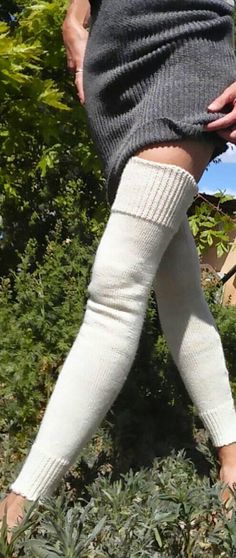 "Solid color, long, knit, leg warmers. I can make these in natural alpaca colors (see the last photo for color options). Or I can make them with organic merino wool. The organic wool is a natural white wool (not a bleached white). I typically have some of the organic merino wool dyed with black walnut husks. Please ask to see the colors that are currently available. The organic merino wool yarn comes in a couple different widths, you can choose the thinner or thicker yarn. If you don't want to t Cozy Cream Fitted Leg Warmers, Cozy Fitted Cream Leg Warmers, Cozy Solid Color Knee-high Socks, Solid Fall Knee-high Socks, Solid Full-length Leg Warmers For Fall, Solid Full Length Leg Warmers For Fall, Over The Knee Winter Leg Warmers, Solid Color Over-the-knee Winter Leg Warmers, Solid Over-the-knee Leg Warmers For Winter