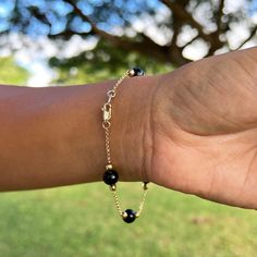 Gift yourself a unique gem that is only from Hawaiʻi. The Hawaiian Black Coral Bracelet in Gold features high-polished and sustainably harvested Hawaiian black coral beads with accenting gold beads and a gold chain. The dramatic contrast will go beautifully with various looks. Bracelet 14k Yellow Gold 8-8.9mm Hawaiian Black Coral Beads Gold Beads Approximately 7.5"-8" in length Locally Made in Hawaiʻi Forever Guarantee (Lifetime Warranty on the life of the piece) Free Shipping on USA Orders $100 Bracelet Or, Black Coral, Coral Bracelet, Yellow Gold Bracelet, Coral Beads, Gold Beads, Delicate Bracelet, Maui, Gold Chains