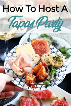 plates with food on them and text overlay how to host a tapas party