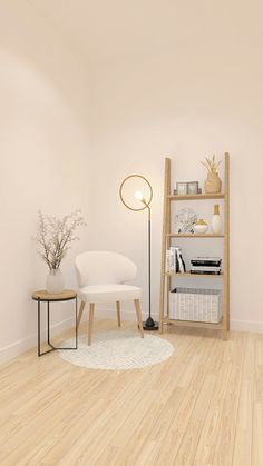 a white chair sitting on top of a hard wood floor next to a book shelf