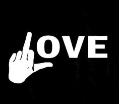 the word love written in white on a black background with a hand pointing at it