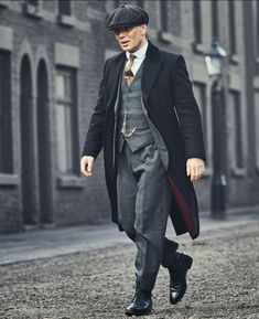 Thomas Shelby Peaky Blinders Grey Three Piece Suit - If it's a wedding or a special occasion, dress up in this Thomas Shelby Suit from Peaky Blinders, a unique stylish three-piece suit for men. Inspired by the actual details from the tv asset and includes complimentary features to give you benefit. The overall package comes with a quality blended jacket, a v-neck style vest and straight fit trousers, all in grey. Recreate your own Peaky Blinder style! Winter Tweed Three-piece Suit For Business, Winter Tweed Three-piece Business Suit, Winter Formal Tweed Three-piece Suit, Winter Business Tweed Three-piece Suit, Classic Wool Three-piece Suit For Winter, Classic Tweed Three-piece Suit For Semi-formal Occasions, Elegant Suit And Tie Accessories For Fall, Winter Wool Three-piece Suit, Winter Slim Fit Three-piece Business Suit