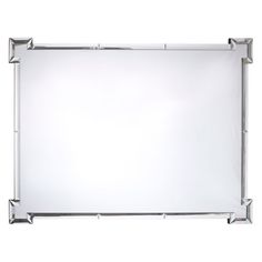 a large mirror is shown against a white background with silver trimmings on the edges