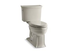 a white toilet sitting on top of a white floor