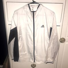 Brand New With Tags Had The Ability To Be Wind And Rain Resistant Size Medium Retails For $60 White Adidas Windbreaker For Spring, Adidas White Windbreaker For Sports, Adidas White Track Jacket For Fall, Adidas White Outerwear For Spring, White Adidas Outerwear For Spring, White Windbreaker For Workwear In Winter, White Winter Windbreaker For Work, White Outerwear For Fall Sports, White Long Sleeve Windbreaker For Fall