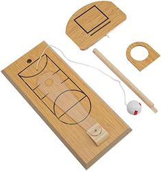 a wooden basketball court with two paddles and a ball