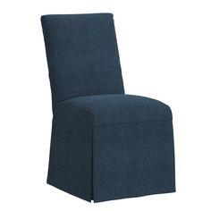 a blue upholstered chair on a white background with the back turned to look like it's made out of fabric