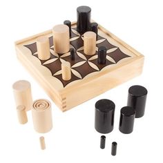 a wooden board game set with black and white pieces