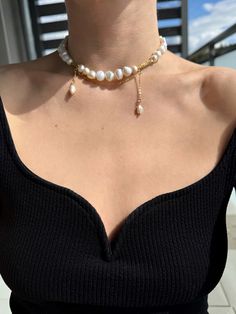 Dainty freshwater pearl choker necklace with details in 24 kt Gold plated Japanese seed beads. Delicately made by hand. Available in three styles: STYLE PRIMO: Necklace length: 37 cm / 14.56 inch + 4 cm / 1.57 inch extension chain. Pearl size: 8 and 10 mm. Color: pearly white. Each cultured pearl is unique, so the shades may vary slightly from the photo. Details made with 24kt gold plated beads. STYLE SECONDO: Necklace length: 38 cm / 14.96 inch + 4 / 1.57 inch extension chain. Pearl size: 8-10m Gold Pearl Choker With Clavicle Chain, Gold Pearl Clavicle Chain Choker, Baroque Pearl Choker Necklace In Pearl White, Pearl White Baroque Pearl Choker Necklace, Baroque Pearl White Choker Necklace, Baroque Pearl Choker Necklace With Pearl Charm, Baroque Pearl Choker Necklace With Pearl Drop, Baroque Pearl Choker With Pearl Chain For Gift, Baroque Pearl Drop Choker Necklace