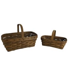 two wooden baskets with handles on white background