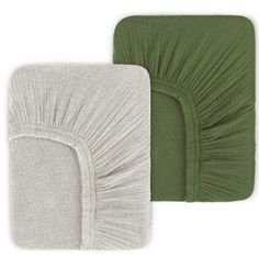 two green and white blankets on top of each other