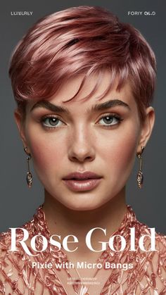 Embrace an elegant and edgy look with a rose gold pixie cut and micro bangs. Visit our page for styling tips and maintenance advice. Save this pin for a chic and bold new style! #RoseGoldPixie #MicroBangs #EdgyHair Pink And Blonde Pixie Hair, Rose Brown Pixie Hair, Fun Colored Pixie Hair, Rose Gold Buzzcut, Rose Gold Pixie Hair, Pink Pixie Haircut, Rose Gold Pixie, Rose Gold Short Hair, Brown Pixie Hair