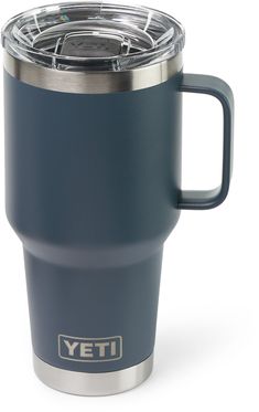 the yeti travel mug is made with stainless steel and has a blue plastic liner