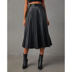 • High-Quality Material :Crafted from superior PU leather, this skirt offers a luxurious feel and long-lasting durability. Its perfect for the stylish woman who demands excellence in every garment. • Versatile Design :Featuring a pleated WAIST A-LINE design, this skirt is versatile enough to be dressed up or down for various occasions. Its large pleated cut adds a touch of elegance and sophistication. • Seasonal Wear :Ideal for autumn and winter, this skirt provides warmth and comfort during the Fitted Leather Pleated Skirt, Leather Pleated Skirt For Night Out, Faux Leather Lined Midi Skirt, Fitted Faux Leather Pleated Skirt For Fall, Faux Leather Lined Skirt For Office, Elegant Pleated Faux Leather Bottoms, Spring Leather Midi-length Skirt, Spring Leather Midi Skirt, Winter Leather Midi Skirt