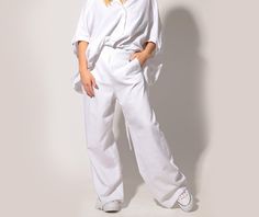 Linen Pants, Wide Leg Pants, White Pants Classic linen trousers in elongated straight leg silhouette: |FIGI| GARMENT FEATURES: *Timeless piece for every wardrobe *Clean, minimalistic design *Elongated straight leg silhouette *Practical side pockets *Invisible back zip fly *Back darts, one on each side *Made from quality linen fabric COLOUR OPTIONS: This product is available in the following colour options: -black; -white; -beige; -dark navy. SIZE & FIT: Model is 175cm and wears size S. COMPO Oversized High-waisted Work Pants, Relaxed Fit High-waisted Pants For Daywear, Oversized Workwear Trousers, Oversized Straight Pants For Work, Oversized Straight Work Pants, Oversized Trousers For Work, Chic Oversized Straight Pants, Oversized Bottoms With Pockets For Daywear, White Baggy Wide Leg Pants For Work