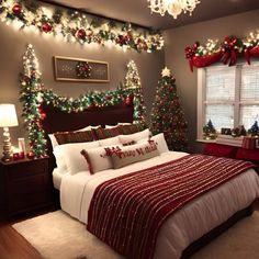 a bedroom decorated for christmas with red and green decorations on the walls, white bedding and lights