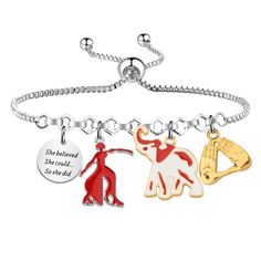 three charms on a silver bracelet with the words she beloved she loved and she is alive