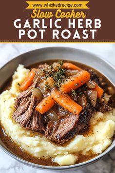 a bowl filled with mashed potatoes, carrots and beef in gravy