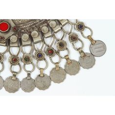 A Moroccan Tribal jewelry vintage a chocker inlaid with colorful glass beads in red and green and dangling coins. Silver, but not of the standard of sterling and richly embellished with applied silver designs and filigree.  Chocker size: 10" height x 10" wide including coins. chocker only is 8" x 8". German nickel coin silver. A Moroccan beautiful ethnic metal silvered jewelry choker.It is a traditional piece of jewelry that is worn around the neck handmade by skilled artisans in Morocco and ref Traditional Filigree Jewelry, Ornate Red Jewelry For Ceremonial Occasions, Red Vintage Jewelry For Festivals, Traditional Medallion Coin Necklace, Ornate Red Jewelry For Festivals, Traditional Medallion Jewelry From Vintage Collection, Vintage Red Jewelry For Festivals, Traditional Red Jewelry For Collectible, Traditional Red Jewelry For Collectors