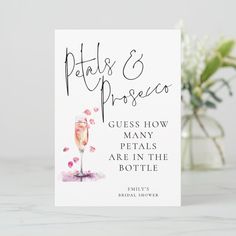 a card with the words pats & prosces on it next to a vase filled with flowers