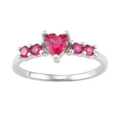 Dazzling and colorful, this Junior Jewels heart birthstone ring is sure to be fast favorite. RING DETAILS Width: 16.6 mm Size 3 Metal: sterling silver Packaging: boxed CUBIC ZIRCONIA DETAILS Center stone size: 4.4 mm Shape: heart, round Setting: prong Color: Red. Gender: female. Age Group: kids. Heart Cocktail, Silver Packaging, Girls Red, Jewelry Show, Girls Jewelry, Sterling Silver Heart, Birthstone Ring, Cocktail Ring, Silver Heart