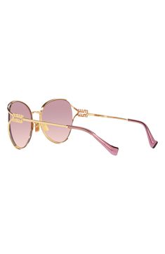 Polished metal frames add a glamorous vibe to Italian-made sunglasses with gradient lenses and signature logo hardware at the temples. 58mm lens width; 20mm bridge width; 125mm temple length 100% UV protection Adjustable nonslip nose pads Metal Made in Italy Dream Accessories, Metal Frames, Eyewear Womens, Signature Logo, Gold Rose, Miu Miu, Uv Protection, Metal Frame, Temple